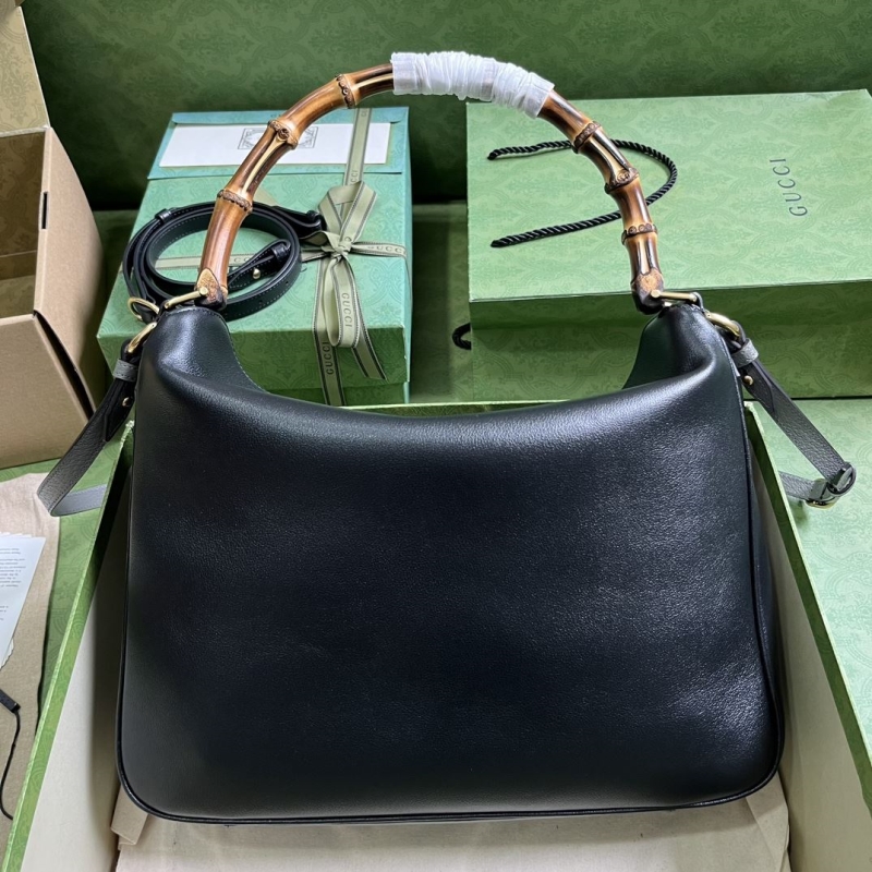 G*u*i top handle bags